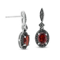 Oval Garnet and 0.2 CT. T.W. Enhanced Black Diamond Vintage-Style Drop Earrings in Sterling Silver