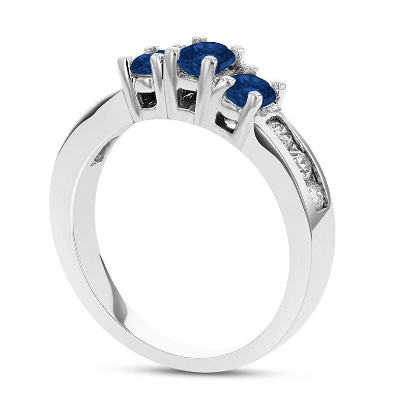 Oval Blue Sapphire and 0.33 CT. T.W. Natural Diamond Channel Three Stone Engagement Ring in Solid 14K White Gold