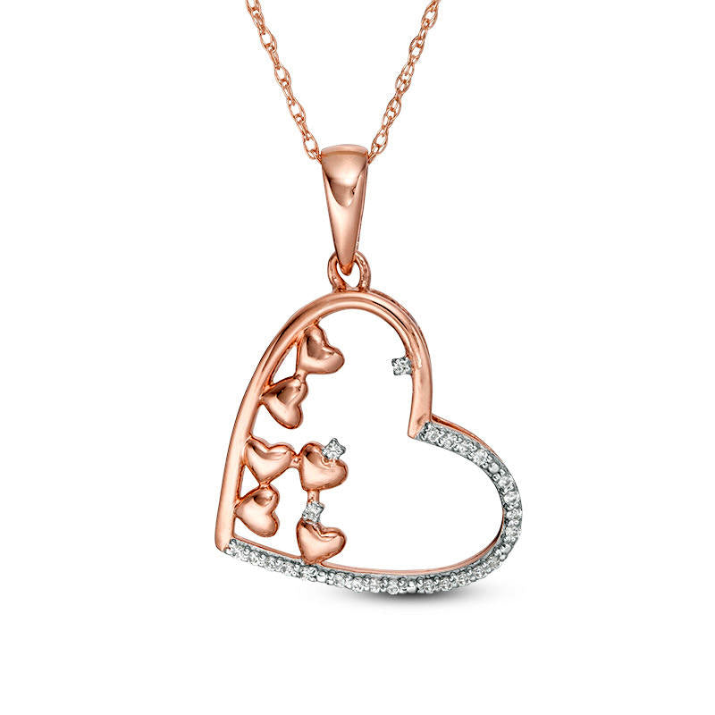 0.1 CT. T.W. Scattered Natural Diamond Tilted Heart Outline Pendant in 10K Rose Gold