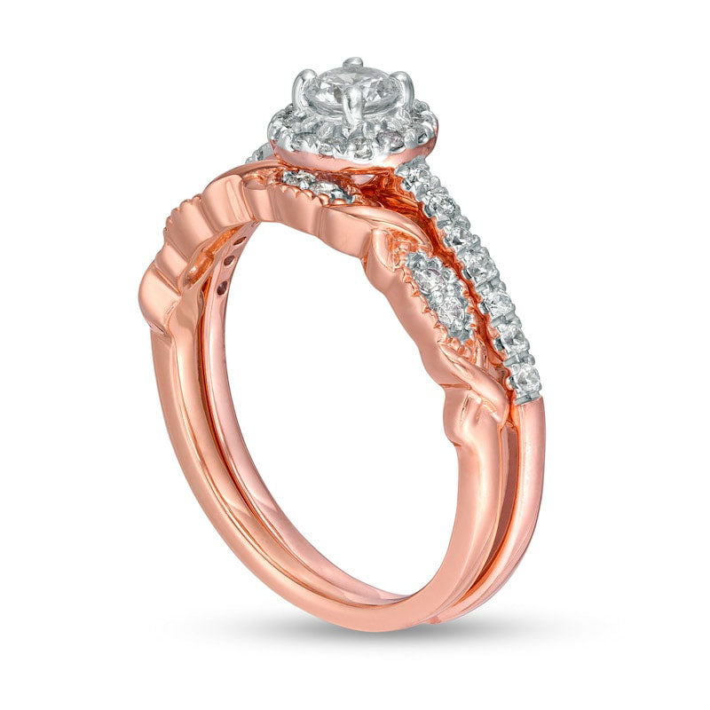 0.63 CT. T.W. Natural Diamond Frame Twist Shank Bridal Engagement Ring Set in Solid 10K Rose Gold