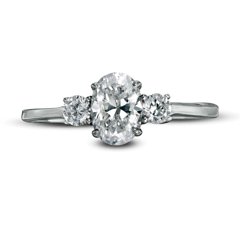 1.0 CT. T.W. Oval and Round Natural Diamond Three Stone Engagement Ring in Solid 14K White Gold