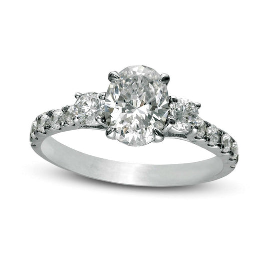 1.75 CT. T.W. Oval and Round Natural Diamond Three Stone Engagement Ring in Solid 14K White Gold