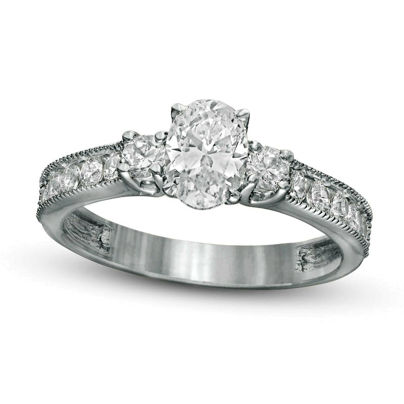 1.17 CT. T.W. Oval and Round Natural Diamond Three Stone Engagement Ring in Solid 14K White Gold