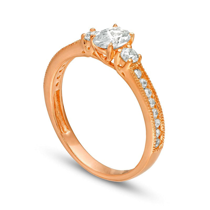 0.88 CT. T.W. Oval and Round Natural Diamond Three Stone Engagement Ring in Solid 14K Rose Gold