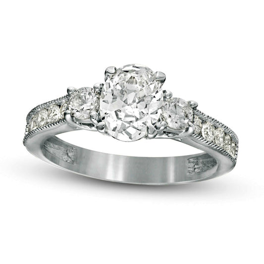 1.75 CT. T.W. Oval and Round Natural Diamond Three Stone Engagement Ring in Solid 14K White Gold