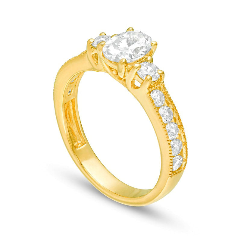 1.33 CT. T.W. Oval and Round Natural Diamond Three Stone Engagement Ring in Solid 14K Gold