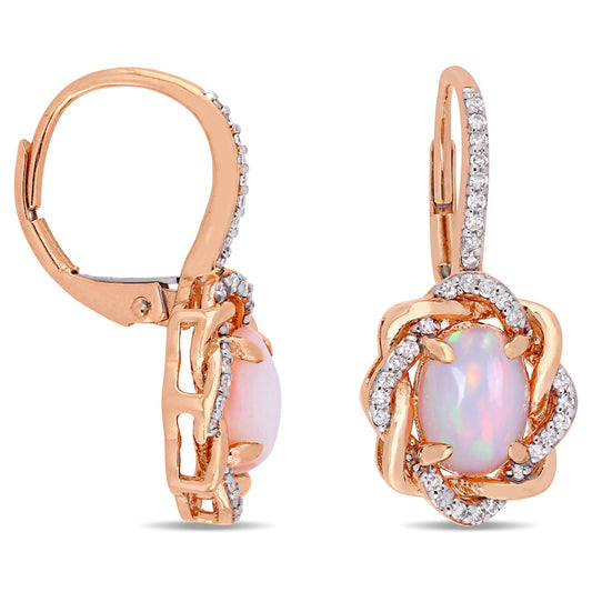 Oval Pink Opal and 0.25 CT. T.W. Diamond Twist Frame Drop Earrings in 10K Rose Gold