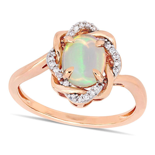 Oval Opal and 0.07 CT. T.W. Natural Diamond Twist Frame Ring in Solid 10K Rose Gold