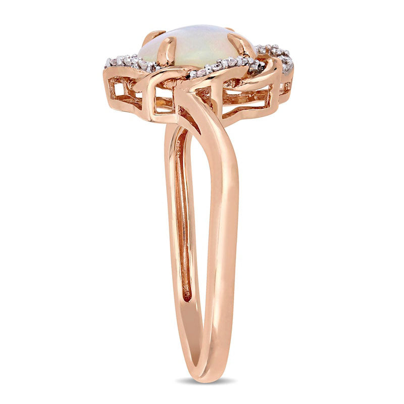 Oval Opal and 0.07 CT. T.W. Natural Diamond Twist Frame Ring in Solid 10K Rose Gold