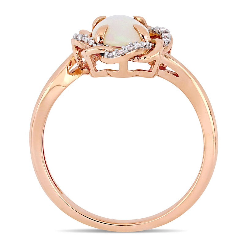 Oval Opal and 0.07 CT. T.W. Natural Diamond Twist Frame Ring in Solid 10K Rose Gold