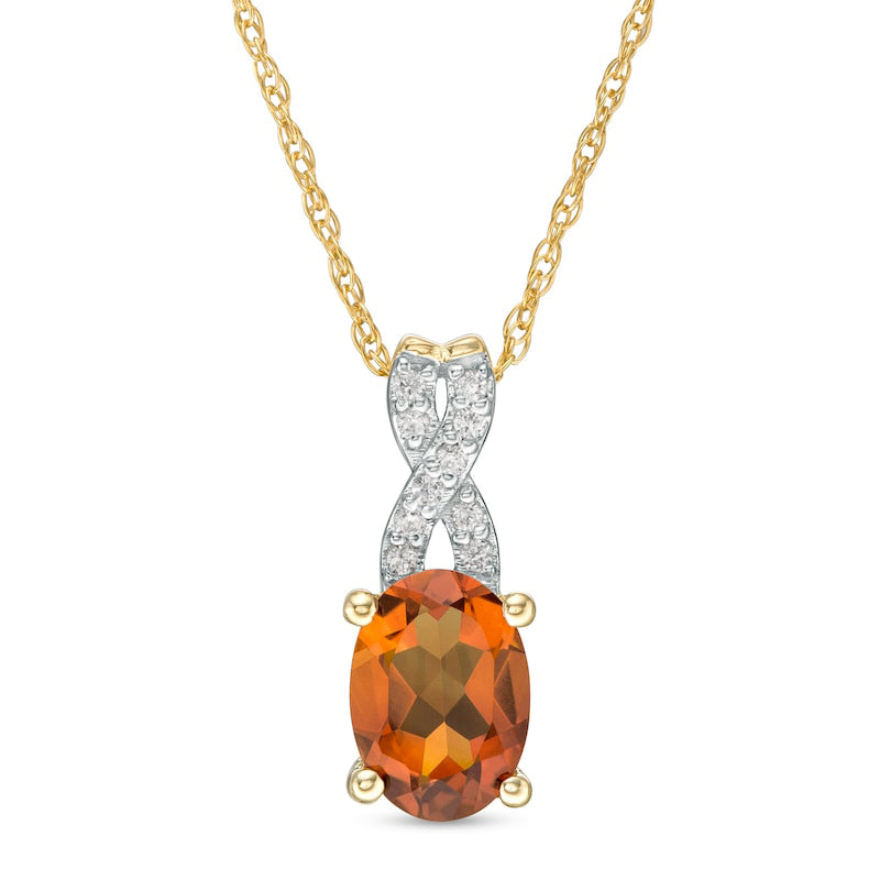 Oval Madeira Citrine and 0.05 CT. T.W. Natural Diamond "X" Drop Pendant in 10K Yellow Gold