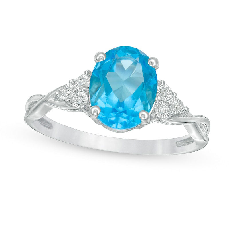 Oval Blue Topaz and Natural Diamond Accent Tri-Sides Twist Shank Ring in Sterling Silver