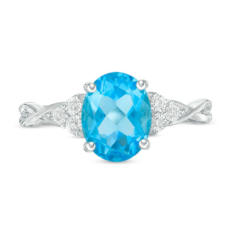 Oval Blue Topaz and Natural Diamond Accent Tri-Sides Twist Shank Ring in Sterling Silver