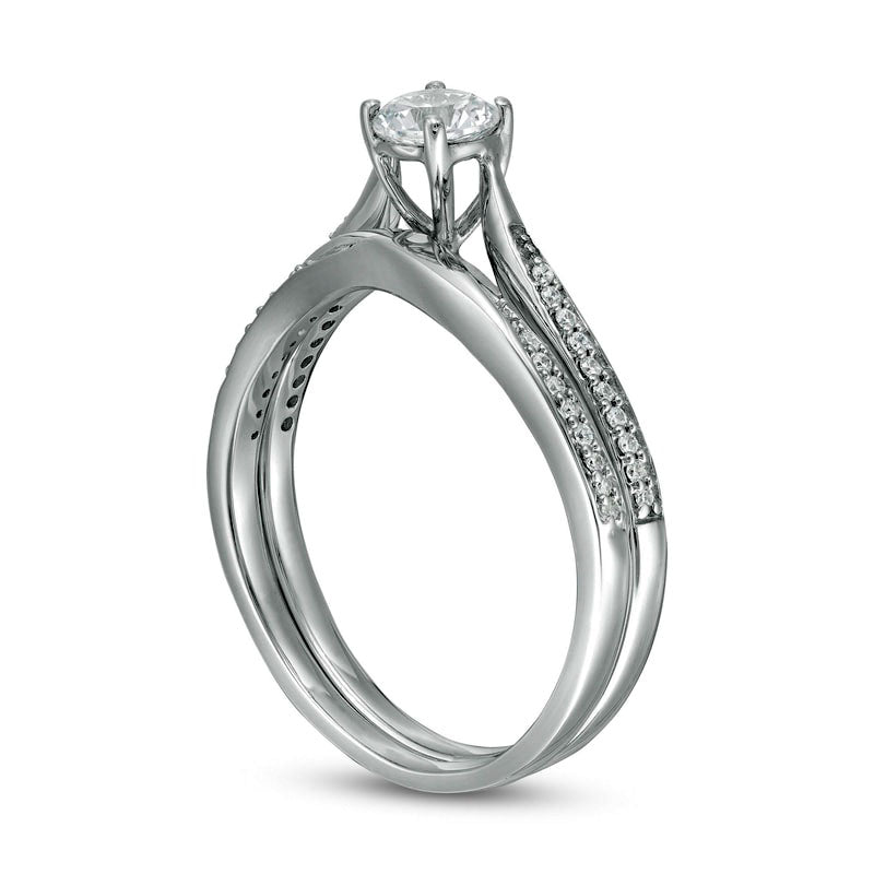 4.5mm Lab-Created White Sapphire and 0.13 CT. T.W. Diamond Waves Bridal Engagement Ring Set in Solid 10K White Gold