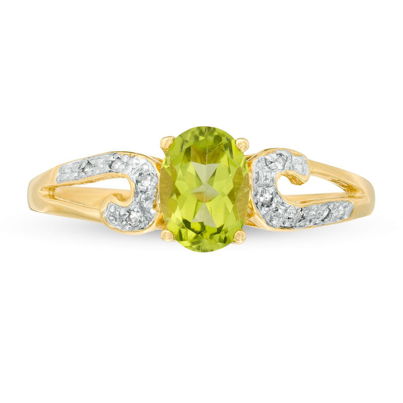 Oval Peridot and 0.05 CT. T.W. Natural Diamond Split Shank Scroll Ring in Solid 10K Yellow Gold