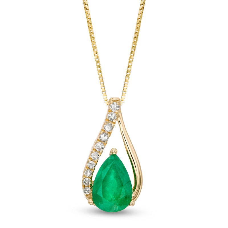 Pear-Shaped Emerald and 0.05 CT. T.W. Natural Diamond Teardrop Pendant in 10K Yellow Gold