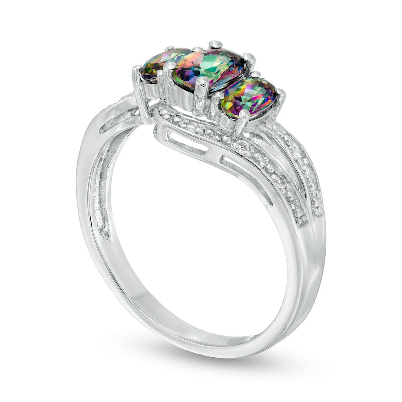 Oval Mystic Fire® and White Topaz Three Stone Bypass Ring in Sterling Silver