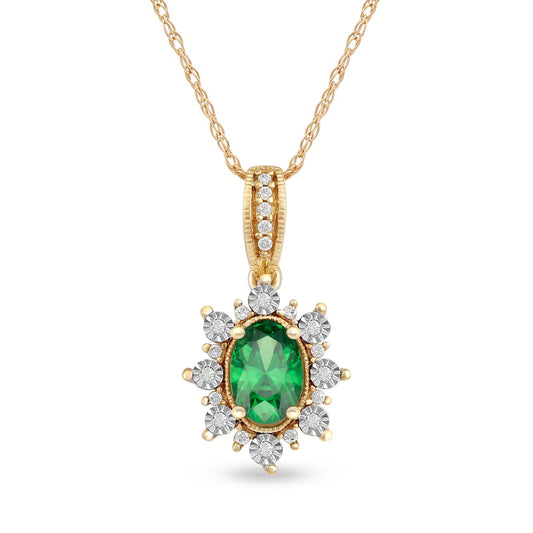 Oval Emerald and 0.07 CT. T.W. Natural Diamond Sunburst Frame Antique Vintage-Style Drop Pendant in 10K Yellow Gold