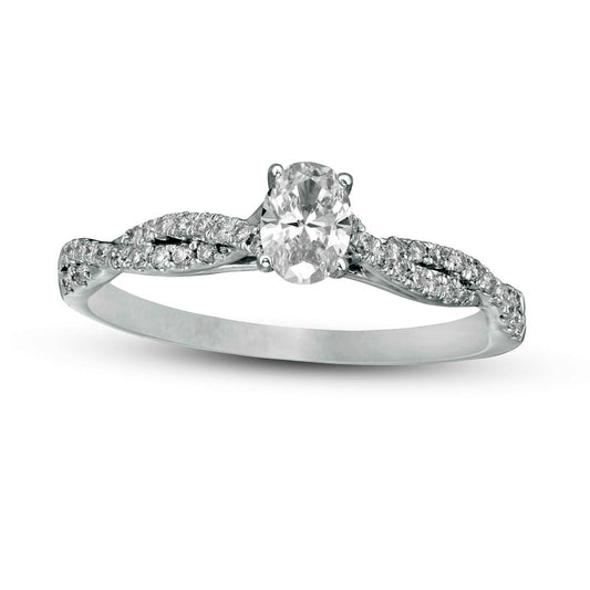 0.50 CT. T.W. Oval Natural Diamond Twist Engagement Ring in Solid 14K White Gold