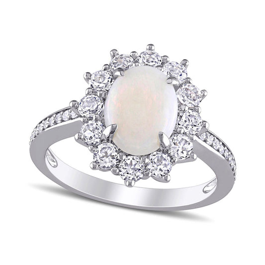 Oval Opal, White Topaz and 0.10 CT. T.W. Natural Diamond Starburst Frame Ring in Sterling Silver