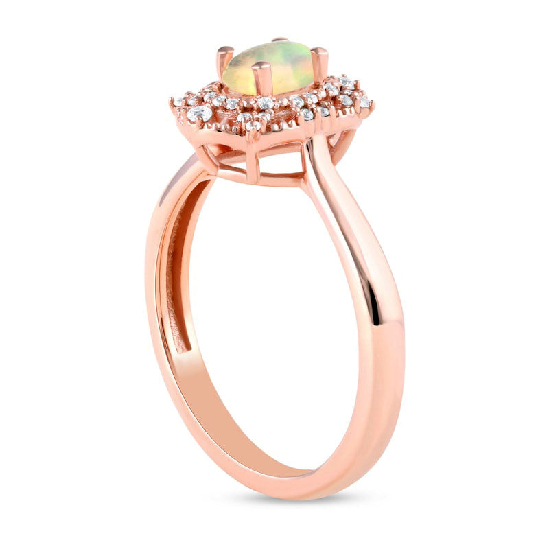 Oval Opal and 0.10 CT. T.W. Natural Diamond Bead Frame Sunburst Ring in Solid 10K Rose Gold