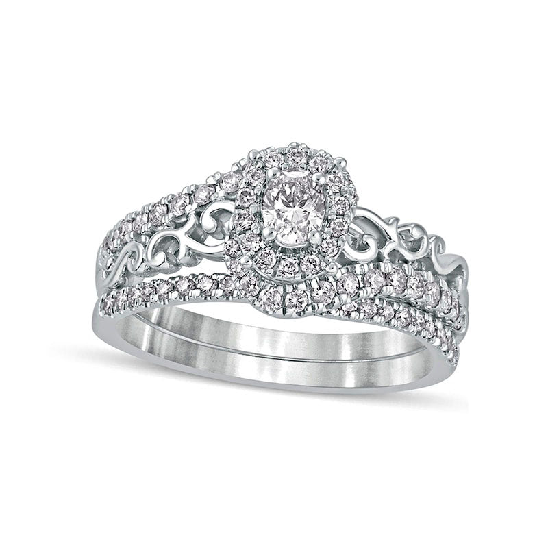 0.63 CT. T.W. Oval Natural Diamond Frame Filigree Bypass Bridal Engagement Ring Set in Solid 10K White Gold