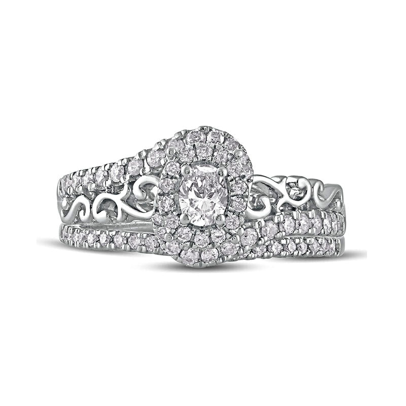 0.63 CT. T.W. Oval Natural Diamond Frame Filigree Bypass Bridal Engagement Ring Set in Solid 10K White Gold