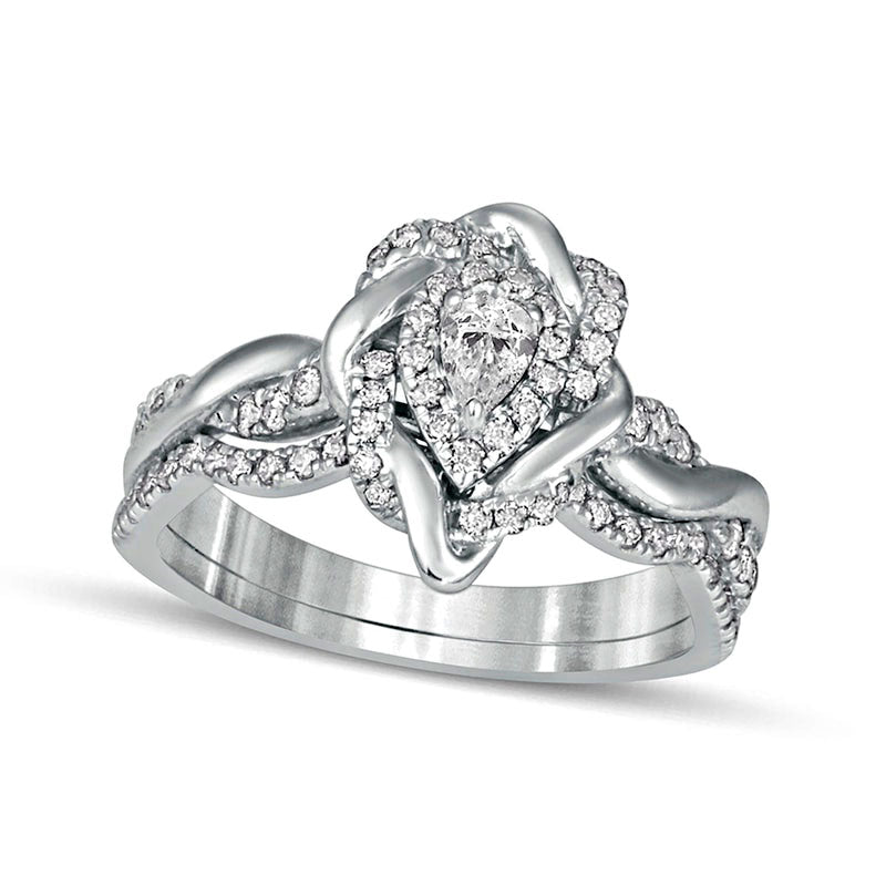 0.63 CT. T.W. Pear-Shaped Natural Diamond Frame Twist Shank Bridal Engagement Ring Set in Solid 10K White Gold