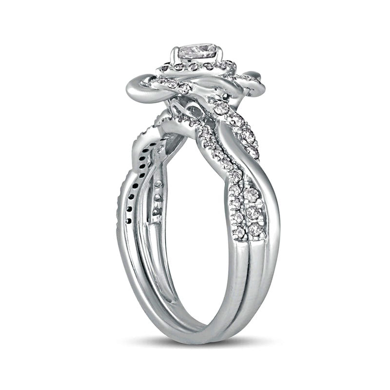 0.63 CT. T.W. Pear-Shaped Natural Diamond Frame Twist Shank Bridal Engagement Ring Set in Solid 10K White Gold