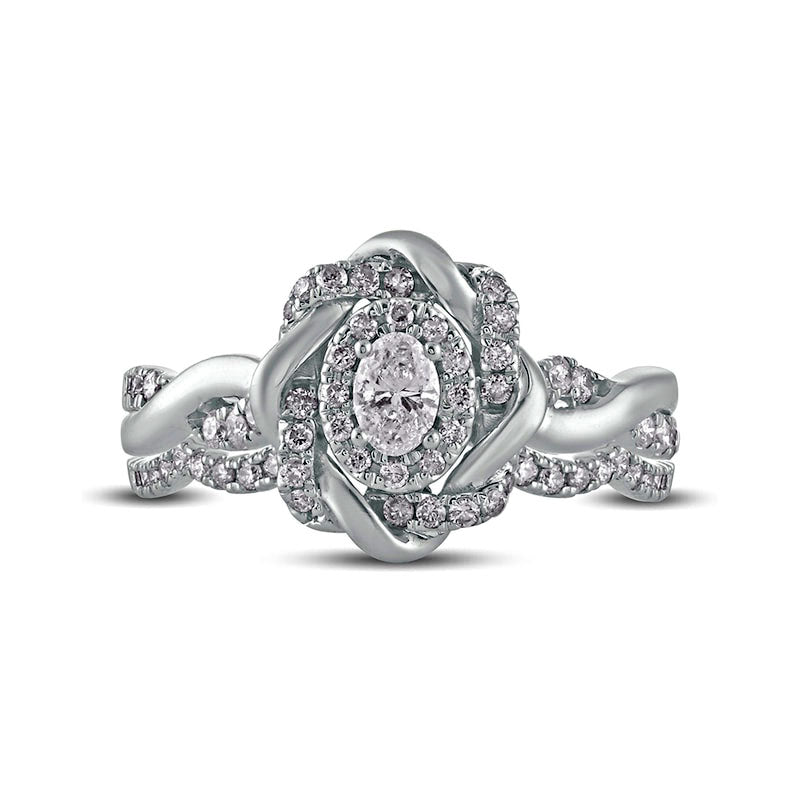 0.63 CT. T.W. Oval Natural Diamond Frame Twist Shank Bridal Engagement Ring Set in Solid 10K White Gold