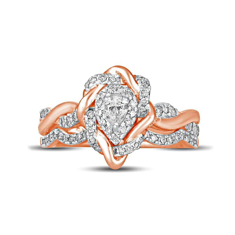 0.63 CT. T.W. Pear-Shaped Natural Diamond Frame Twist Shank Bridal Engagement Ring Set in Solid 10K Rose Gold