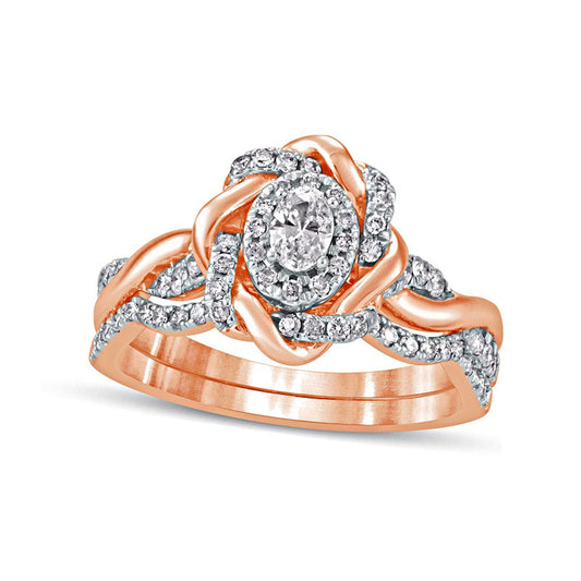 0.63 CT. T.W. Oval Natural Diamond Frame Twist Shank Bridal Engagement Ring Set in Solid 10K Rose Gold