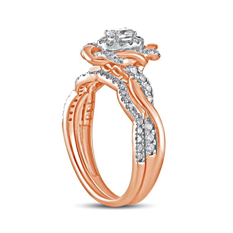 0.63 CT. T.W. Oval Natural Diamond Frame Twist Shank Bridal Engagement Ring Set in Solid 10K Rose Gold