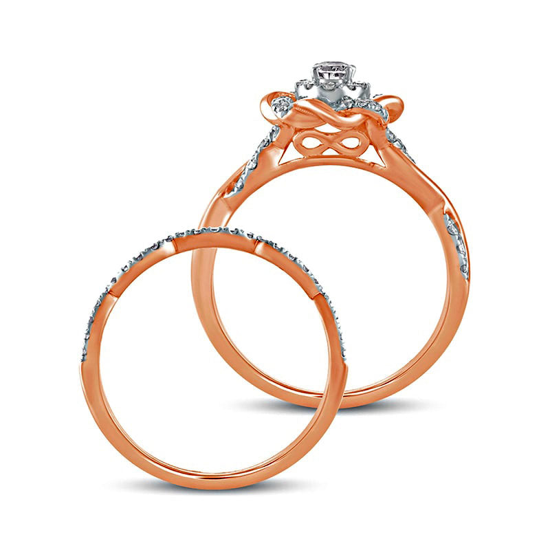 0.63 CT. T.W. Oval Natural Diamond Frame Twist Shank Bridal Engagement Ring Set in Solid 10K Rose Gold