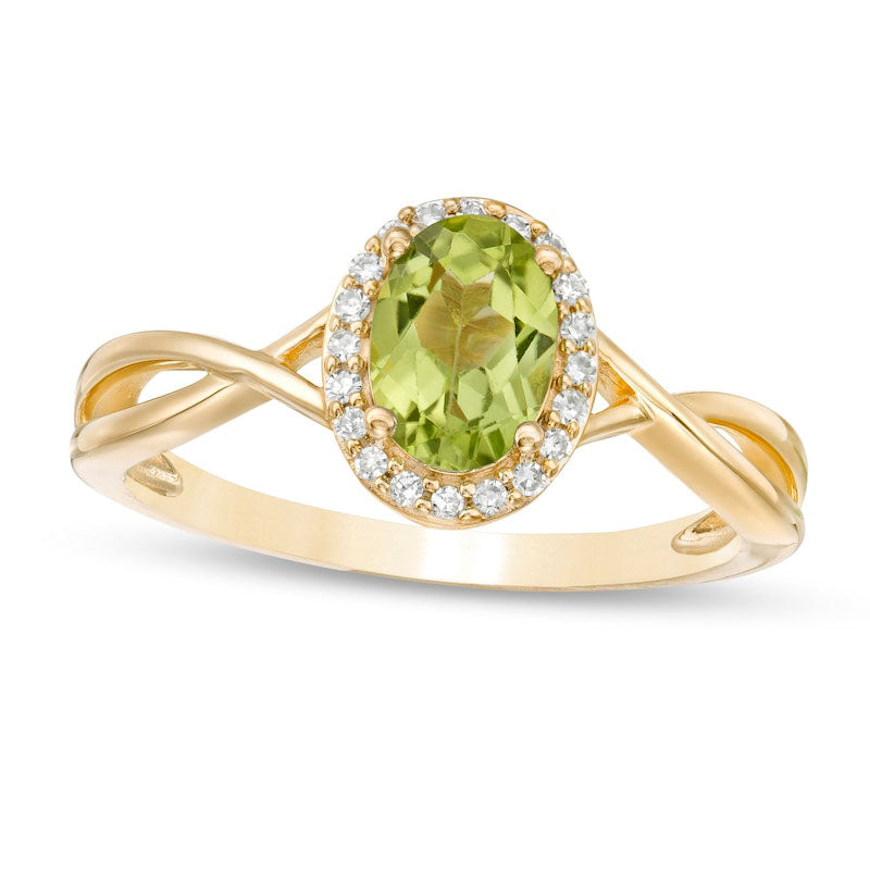 Oval Peridot and 0.07 CT. T.W. Natural Diamond Frame Twist Shank Ring in Solid 10K Yellow Gold