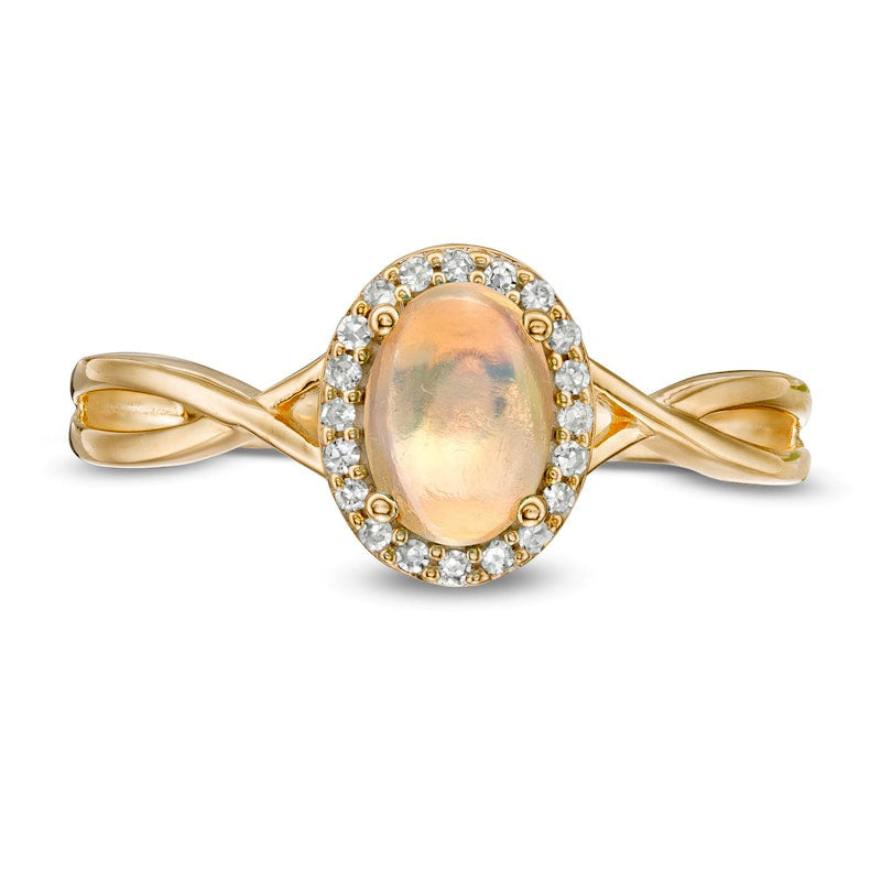 Oval Opal and 0.07 CT. T.W. Natural Diamond Frame Twist Shank Ring in Solid 10K Yellow Gold