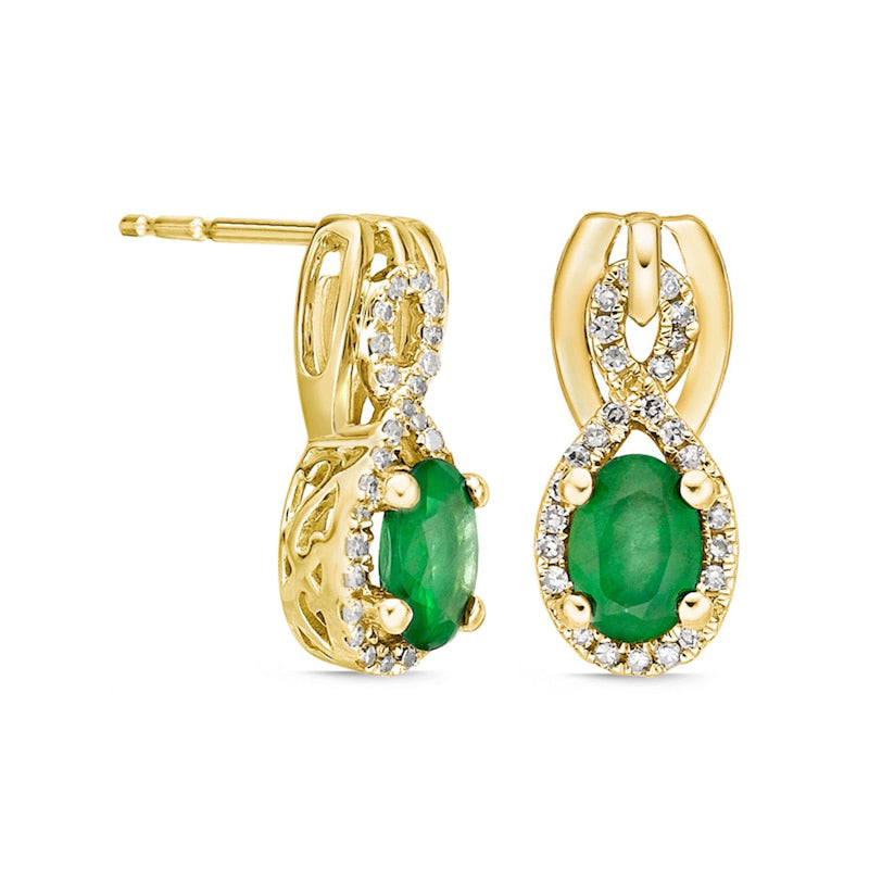 Oval Emerald and 0.2 CT. T.W. Diamond Infinity Drop Earrings in 10K Gold