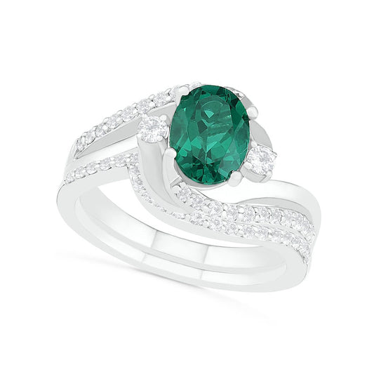 Oval Lab-Created Emerald and White Sapphire Side Accent Double Bypass Split Shank Bridal Engagement Ring Set in Sterling Silver