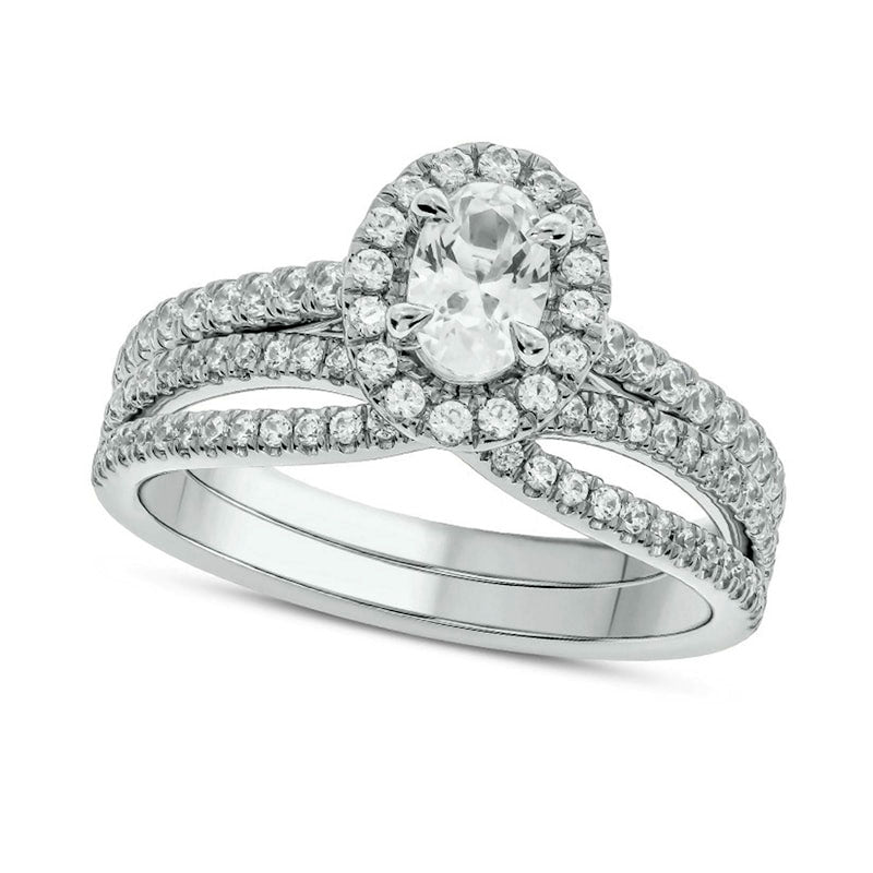 1.0 CT. T.W. Oval Natural Diamond Frame Crossover Bridal Engagement Ring Set in Solid 10K White Gold