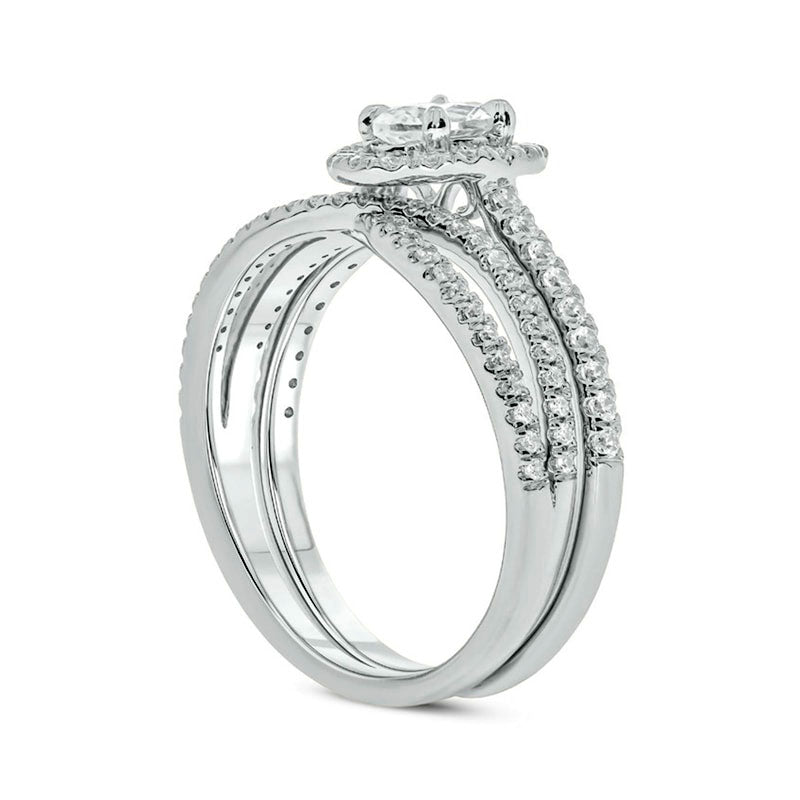 1.0 CT. T.W. Oval Natural Diamond Frame Crossover Bridal Engagement Ring Set in Solid 10K White Gold