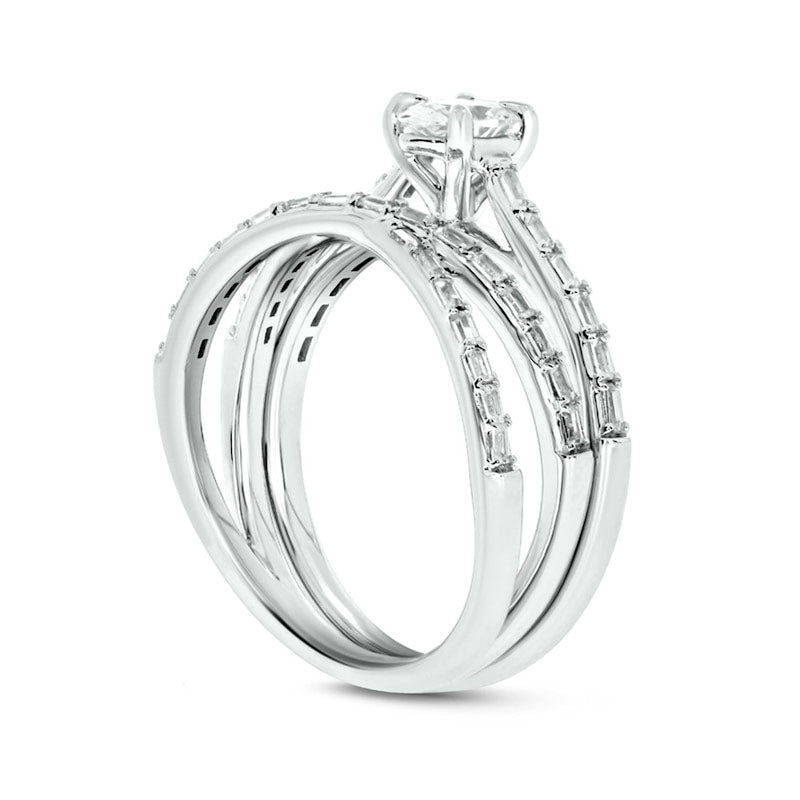 0.75 CT. T.W. Oval and Baguette Natural Diamond Crossover Bridal Engagement Ring Set in Solid 10K White Gold