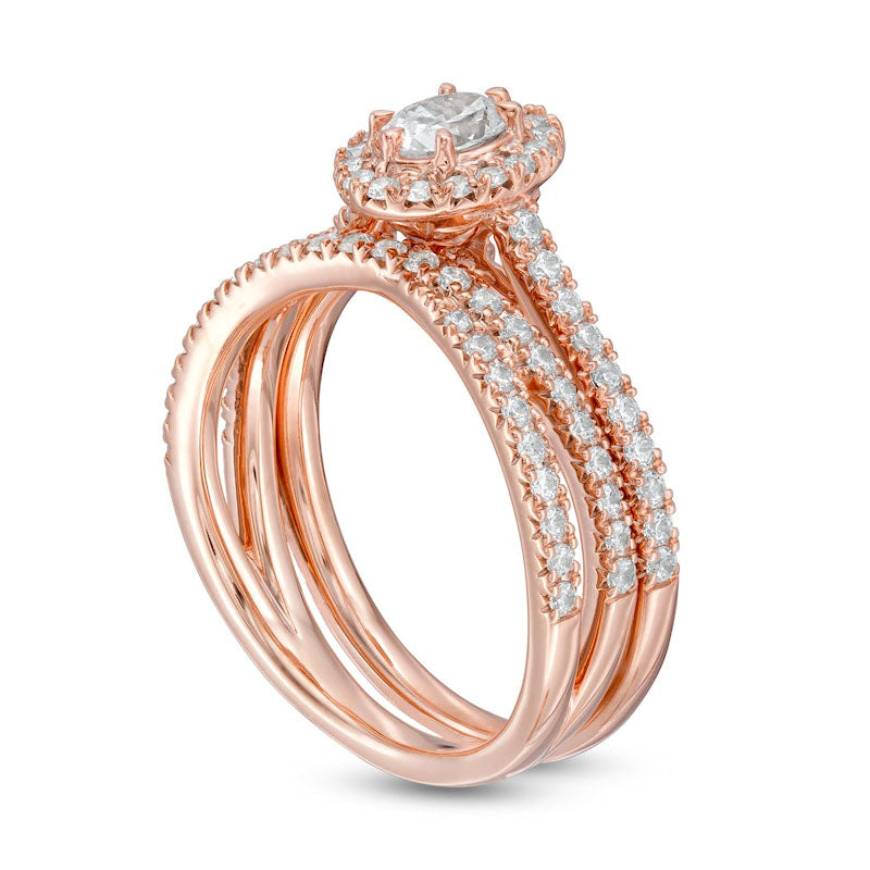 1.0 CT. T.W. Oval Natural Diamond Frame Crossover Bridal Engagement Ring Set in Solid 14K Rose Gold