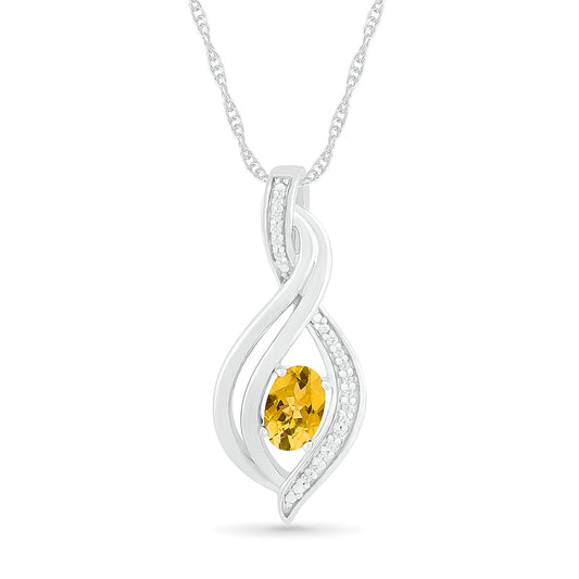 Oval Citrine and 0.05 CT. T.W. Natural Diamond Flame Drop Pendant in Sterling Silver