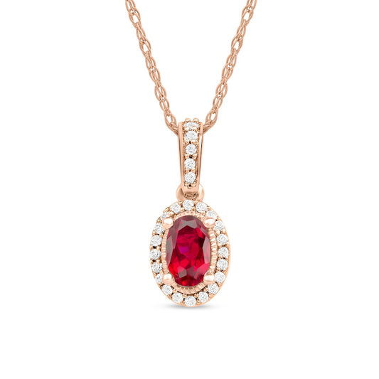 Oval Ruby and 0.05 CT. T.W. Natural Diamond Framed Antique Vintage-Style Drop Pendant in 10K Rose Gold