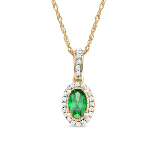 Oval Emerald and 0.05 CT. T.W. Natural Diamond Framed Antique Vintage-Style Drop Pendant in 10K Yellow Gold