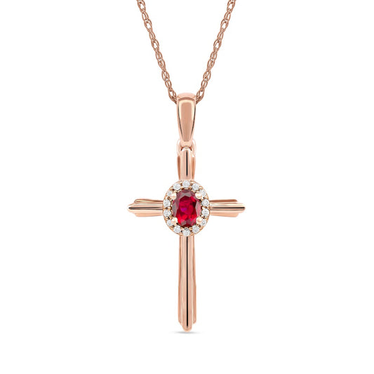 Oval Ruby and 0.05 CT. T.W. Natural Diamond Frame Layered Cross Pendant in 10K Rose Gold