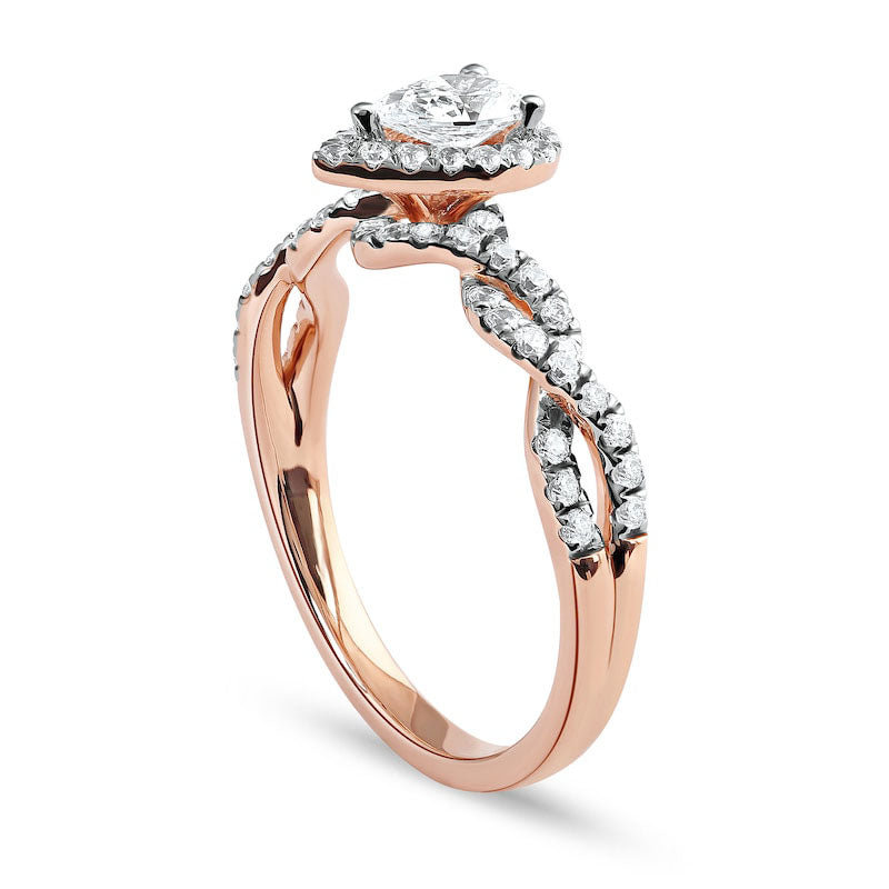 0.75 CT. T.W. Pear-Shaped Natural Diamond Frame Twist Shank Engagement Ring in Solid 10K Rose Gold (I/I1)