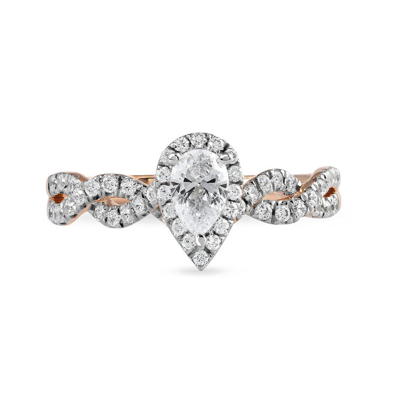 0.75 CT. T.W. Pear-Shaped Natural Diamond Frame Twist Shank Engagement Ring in Solid 10K Rose Gold (I/I1)