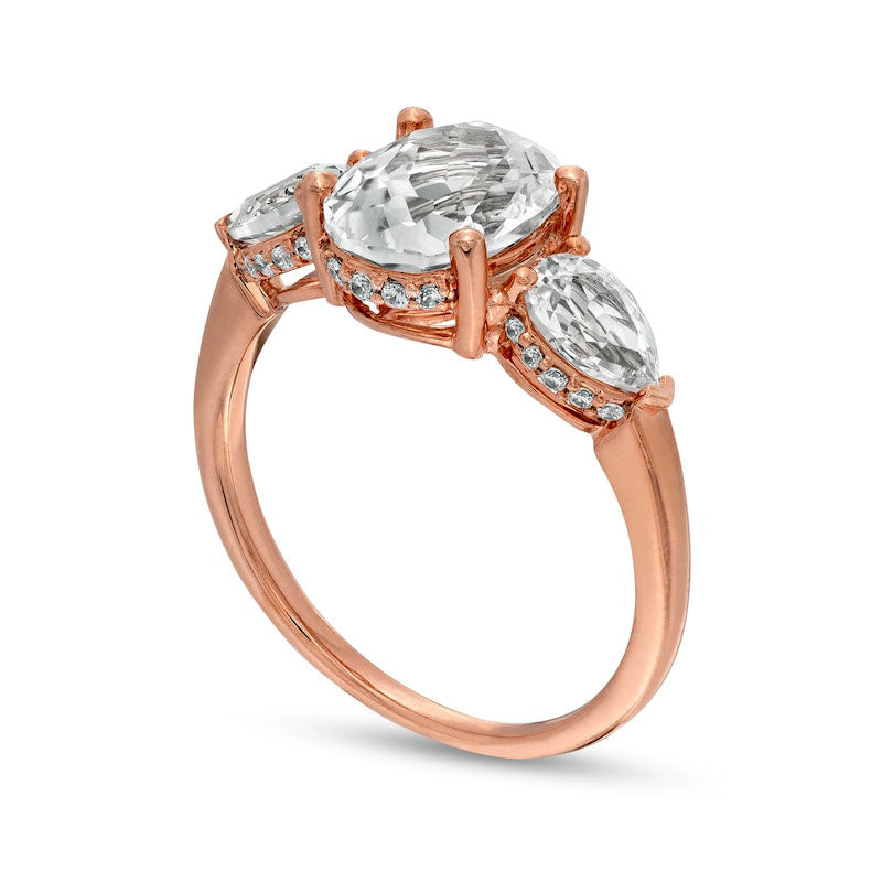 Oval White Lab-Created Sapphire and 0.17 CT. T.W. Diamond Frame Three Stone Engagement Ring in Solid 10K Rose Gold