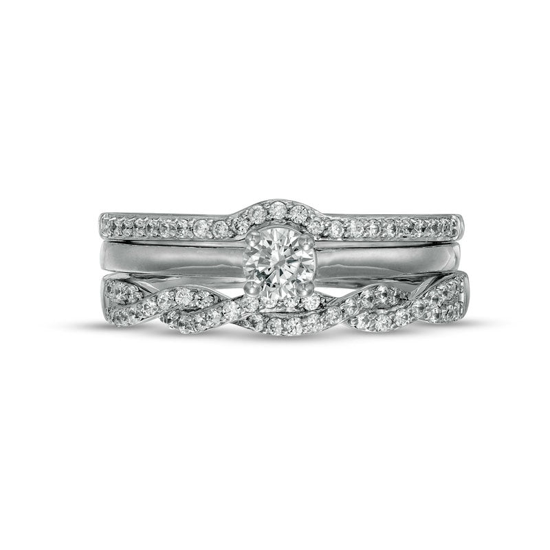 0.50 CT. T.W. Natural Diamond Twist Three Piece Bridal Engagement Ring Set in Solid 10K White Gold (J/I3)